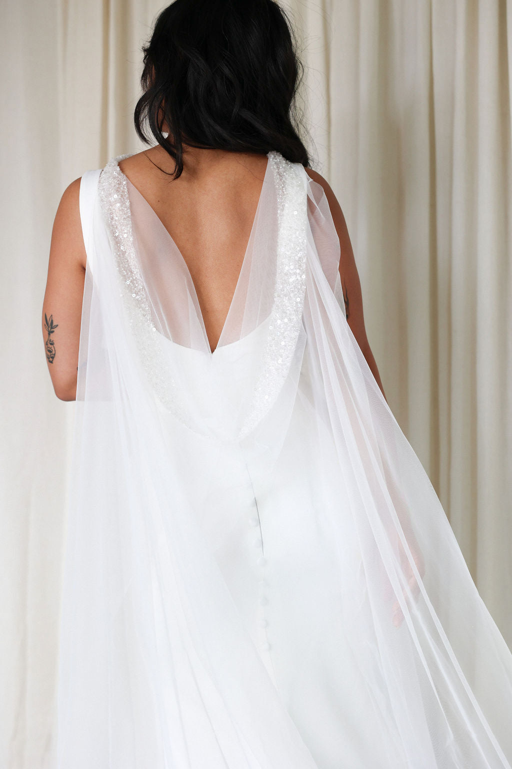 Bride Wearing Sequin Wedding Cape