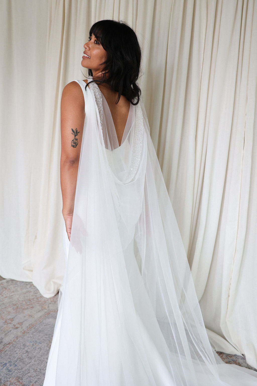 Bride Wearing Sequin Wedding Cape