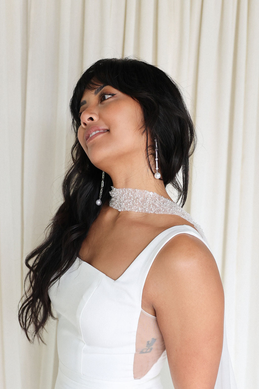 Bride Wearing Sequin Wedding Cape