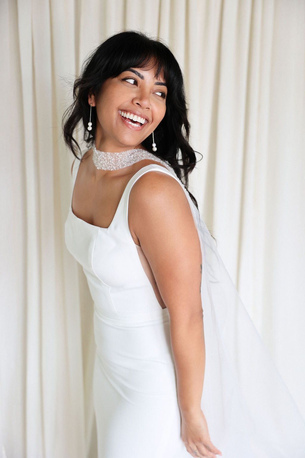 Bride Wearing Sequin Wedding Cape