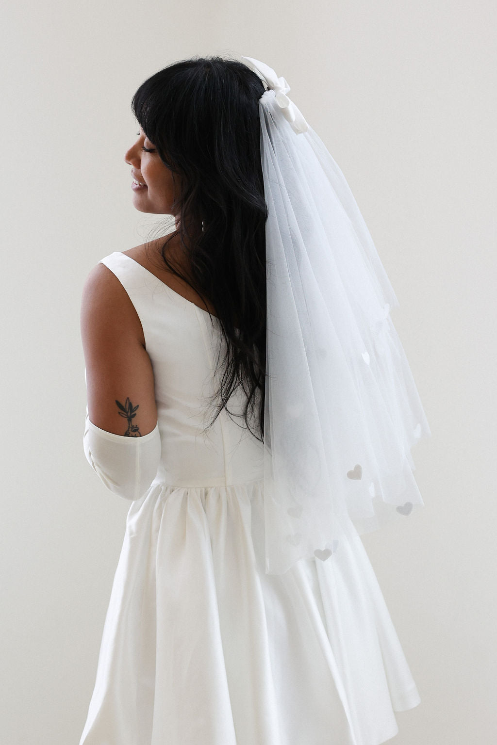 Bride Wearing Heart Veil