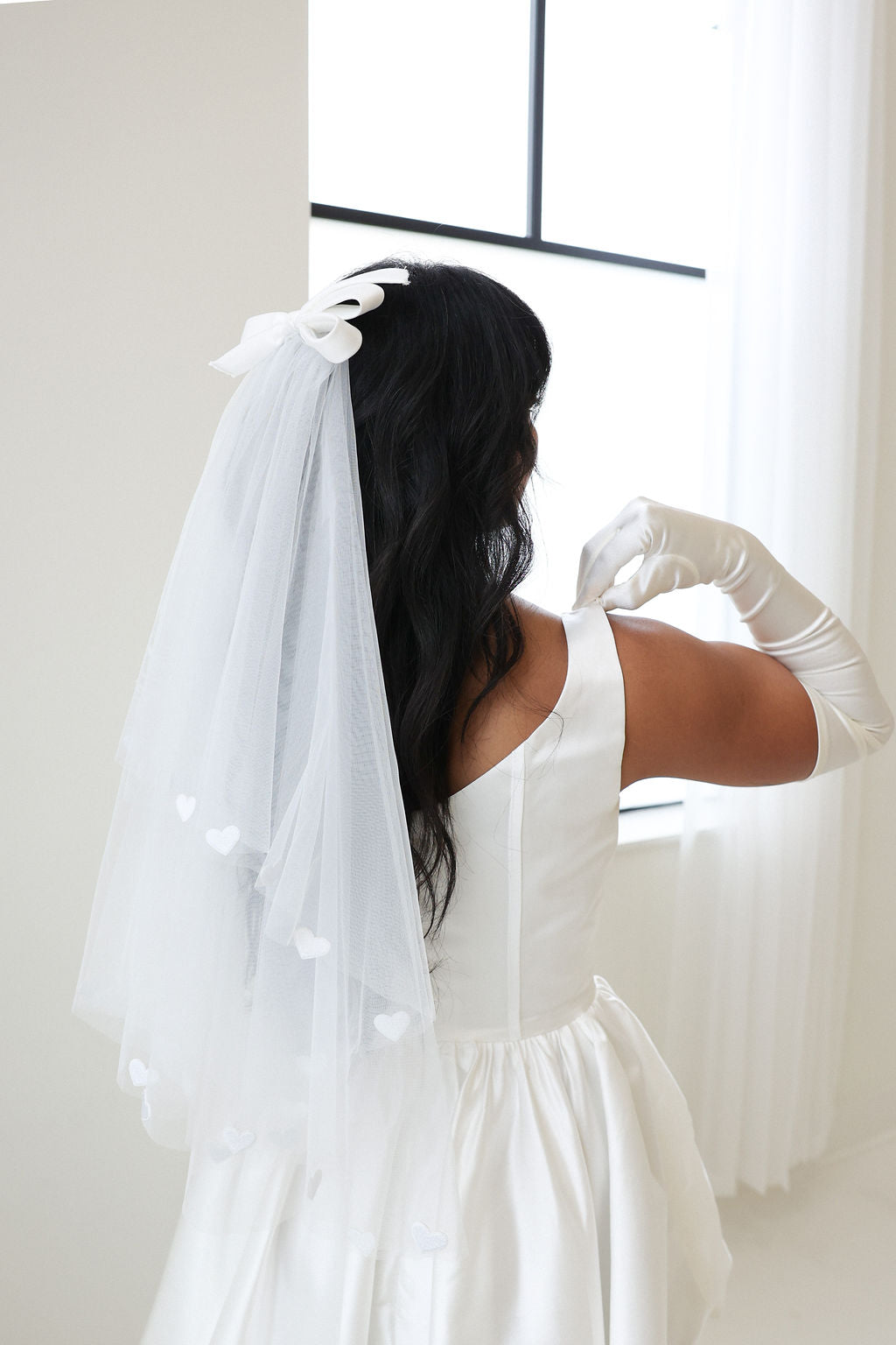 Bride Wearing Heart Veil