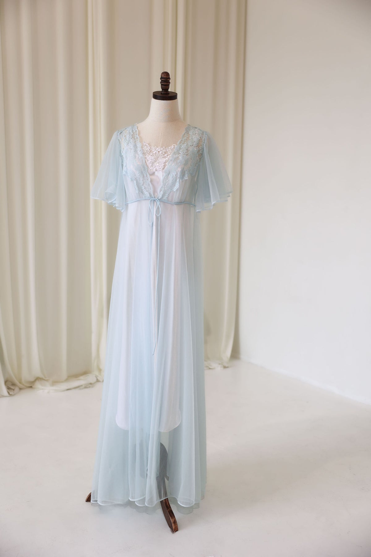 A light blue bridal vintage getting ready robe