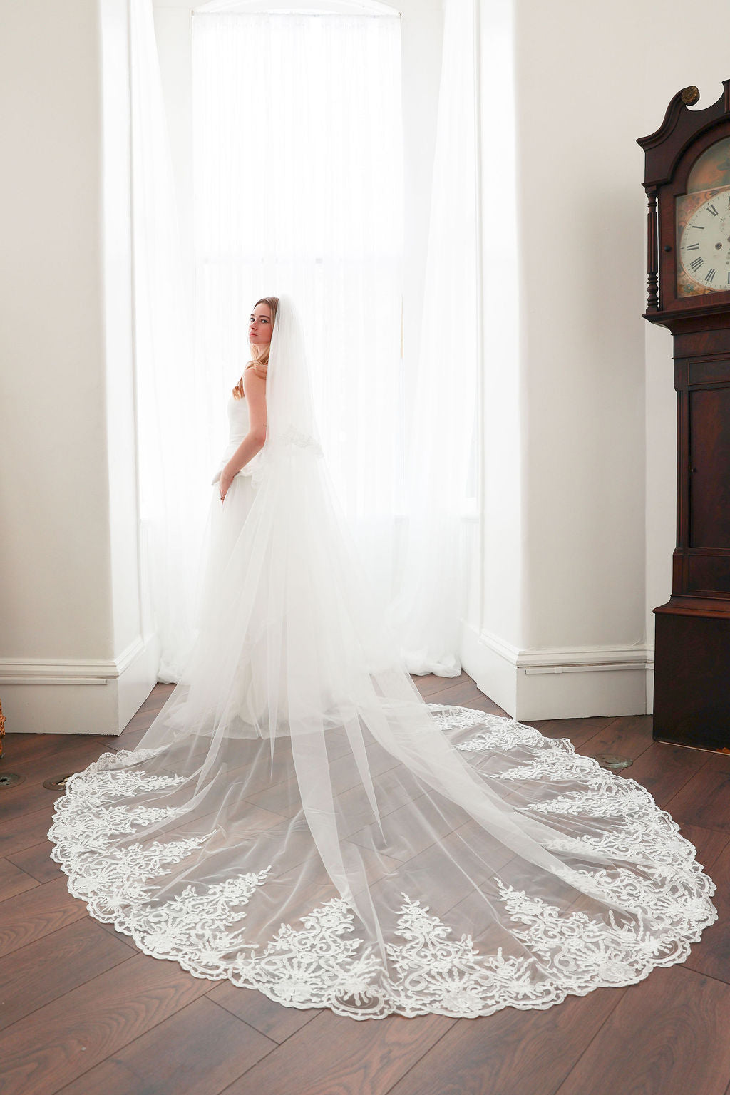 Bride Wearing Cathedral Length Lace Blusher Veil