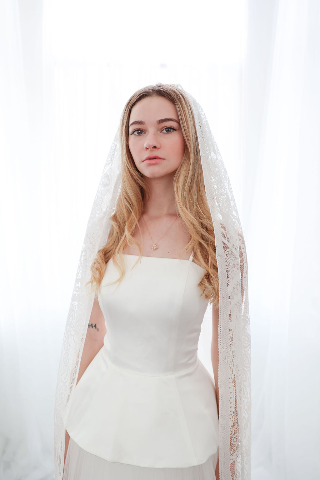 Bride With Boho Fringe Wedding Veil
