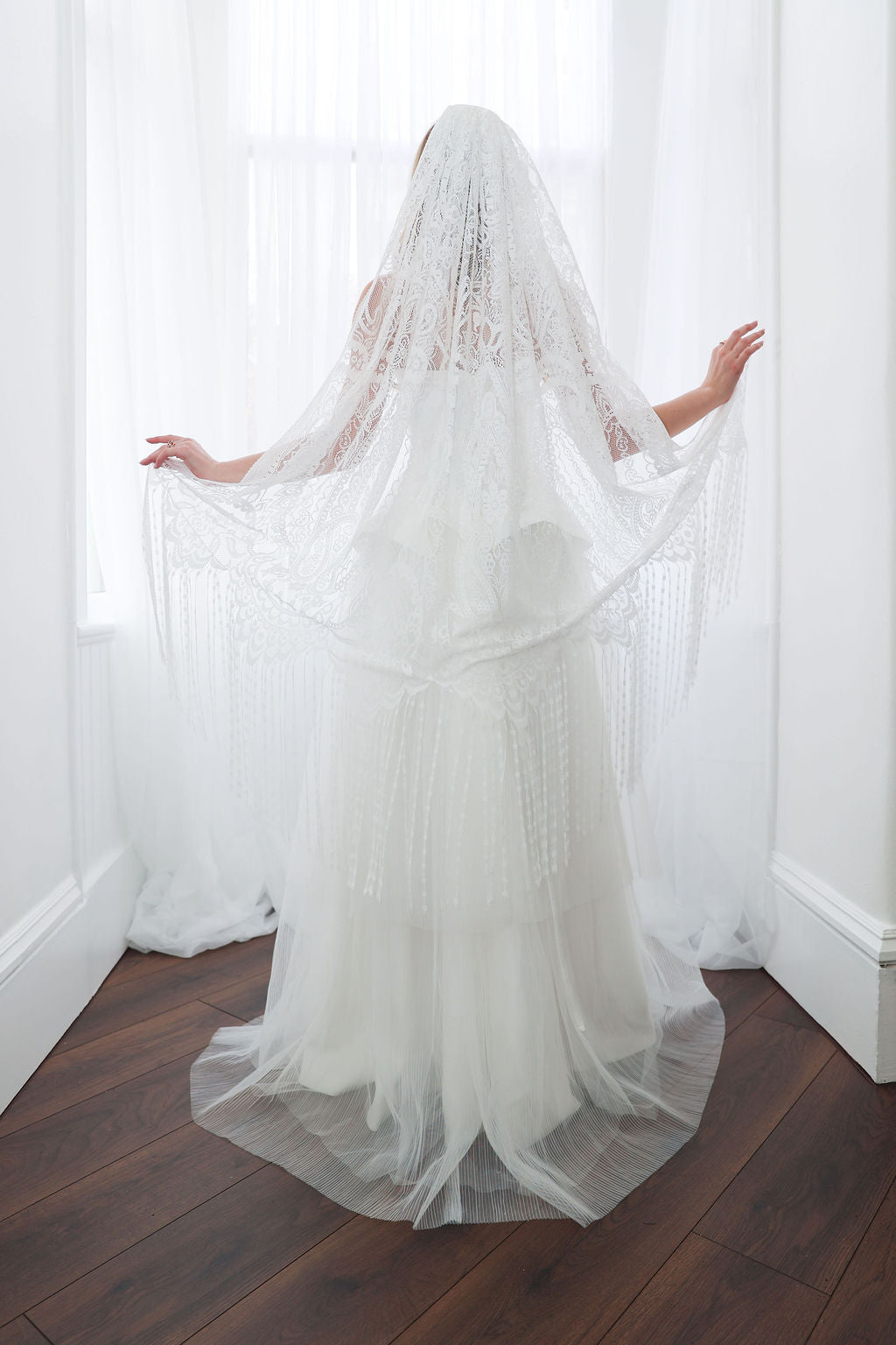 Bride With Boho Fringe Wedding Veil