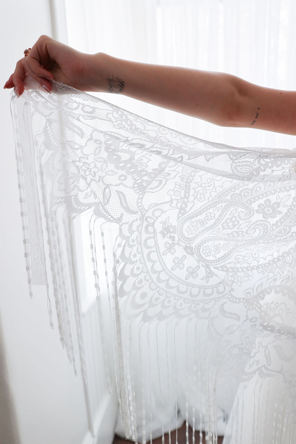 Bride With Boho Fringe Wedding Veil